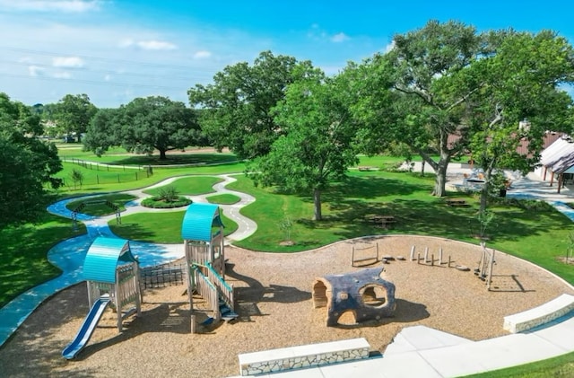 view of home's community featuring a playground