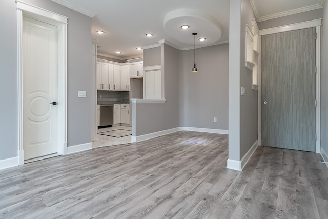 interior space with white cabinets, dishwasher, light wood-type flooring, and crown molding