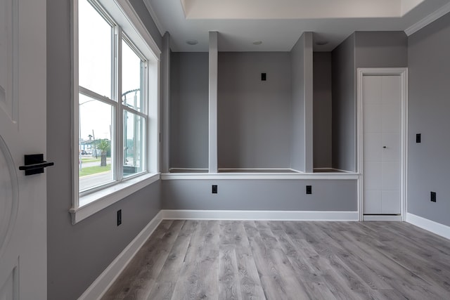 empty room with light hardwood / wood-style floors