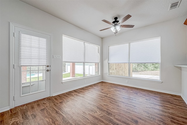 interior space with ceiling fan and plenty of natural light