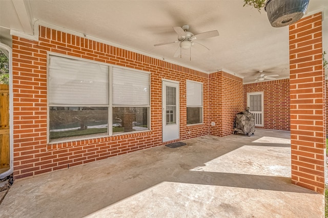 view of patio / terrace featuring ceiling fan