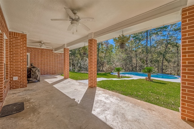 view of patio / terrace featuring ceiling fan