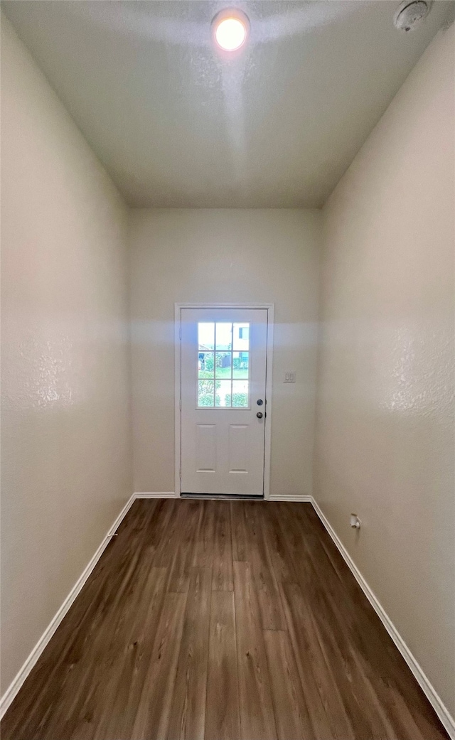 doorway to outside featuring dark hardwood / wood-style floors