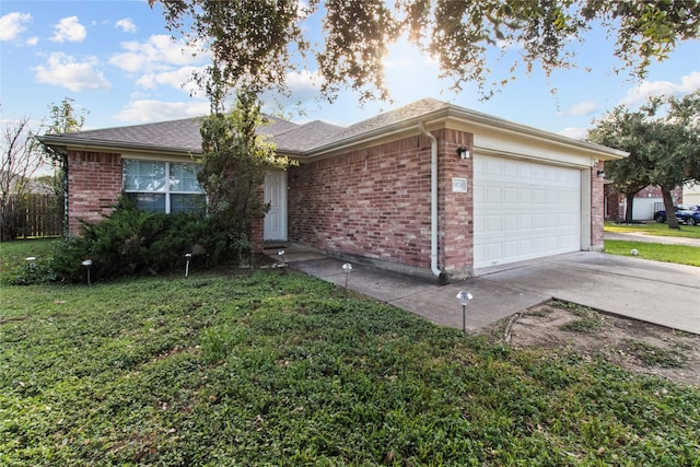 single story home with a garage and a front yard