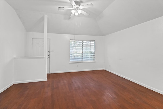 unfurnished room with ceiling fan, dark hardwood / wood-style flooring, and vaulted ceiling