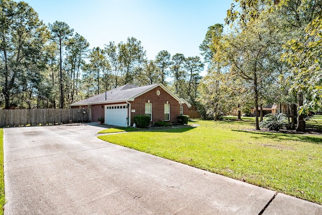 view of side of home with a garage and a lawn