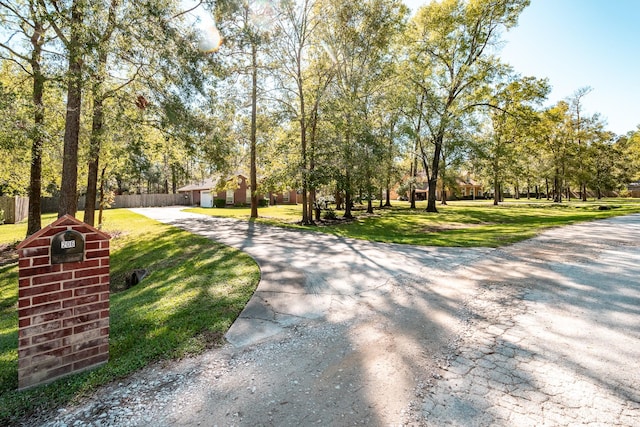 206 Private Road 635, Dayton, TX 77535 - view of home's community featuring driveway