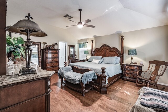 206 Private Road 635, Dayton, TX 77535 - bedroom featuring vaulted ceiling, light wood-style flooring, and ceiling fan