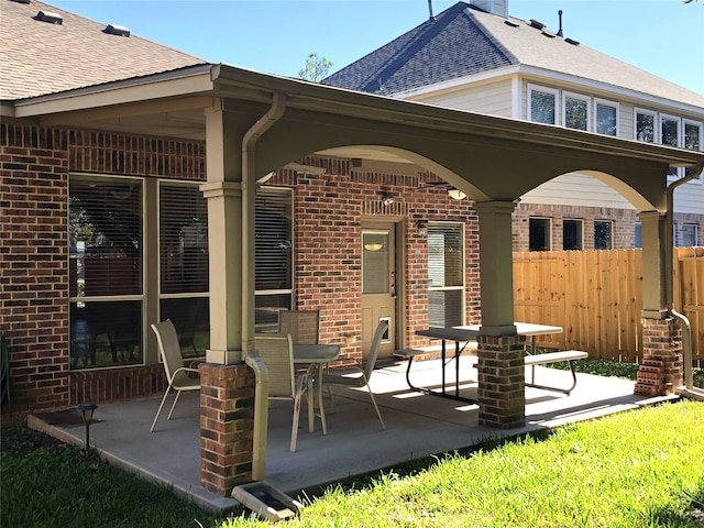 rear view of property with a patio area