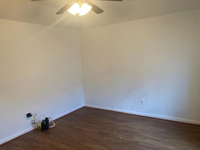 unfurnished room featuring ceiling fan and dark hardwood / wood-style floors