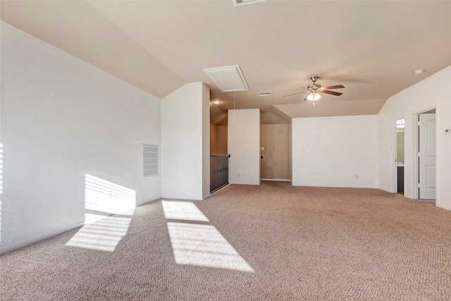 unfurnished living room featuring light carpet, ceiling fan, and lofted ceiling