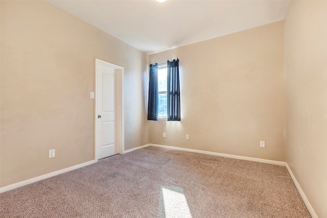 unfurnished room with carpet floors