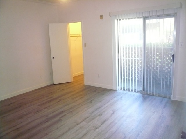 empty room featuring hardwood / wood-style flooring