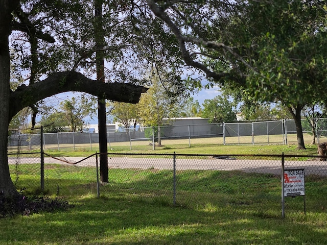 surrounding community featuring a lawn