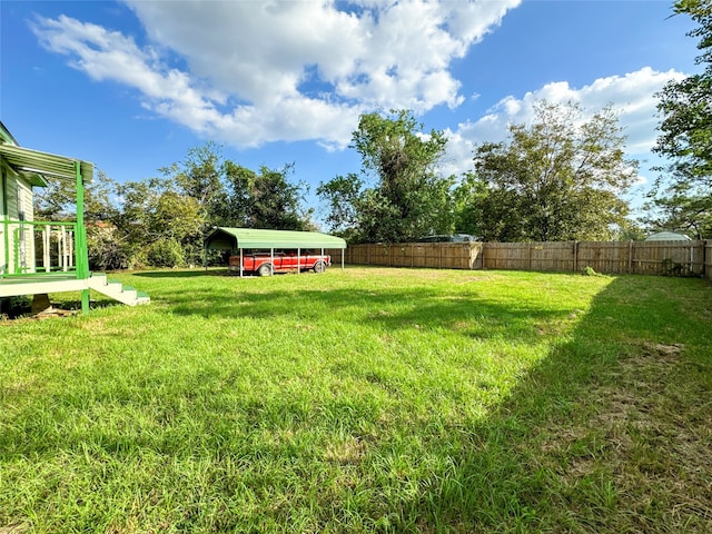 view of yard featuring a carport