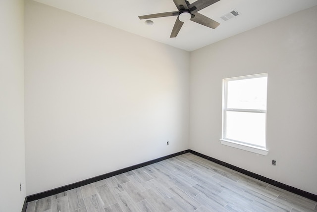 209 Silverleaf Rd, Sweeny, TX 77480 - unfurnished room featuring ceiling fan, light wood-type flooring, and baseboards