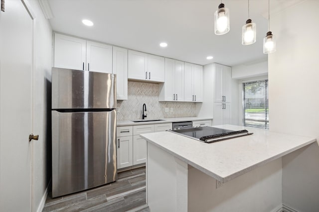 kitchen featuring sink, white cabinetry, stainless steel appliances, and dark wood-type flooring