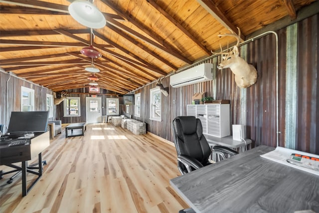 unfurnished office featuring light wood-type flooring, wood ceiling, an AC wall unit, vaulted ceiling with beams, and wood walls