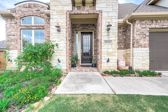 property entrance featuring a garage