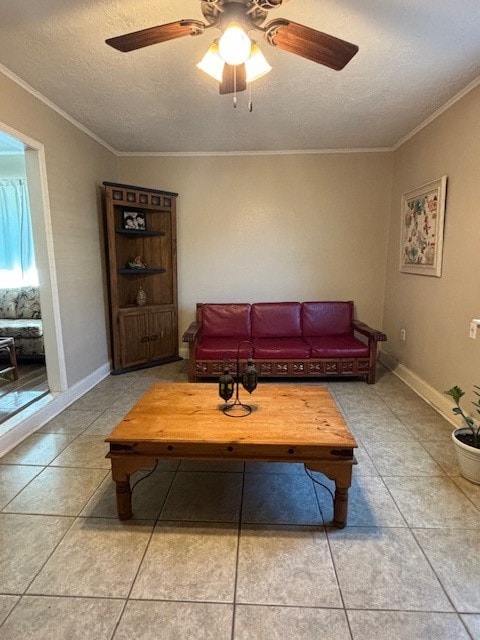 tiled living room with crown molding, ceiling fan, and a textured ceiling