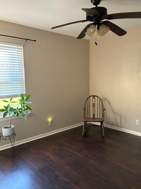 unfurnished room featuring dark hardwood / wood-style floors and ceiling fan