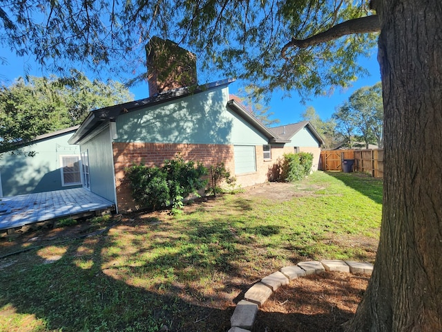 view of yard featuring a deck