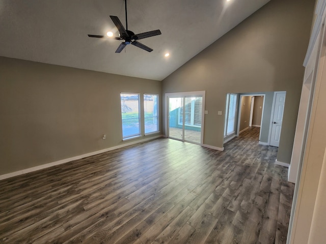 unfurnished room featuring ceiling fan, high vaulted ceiling, and dark wood-type flooring