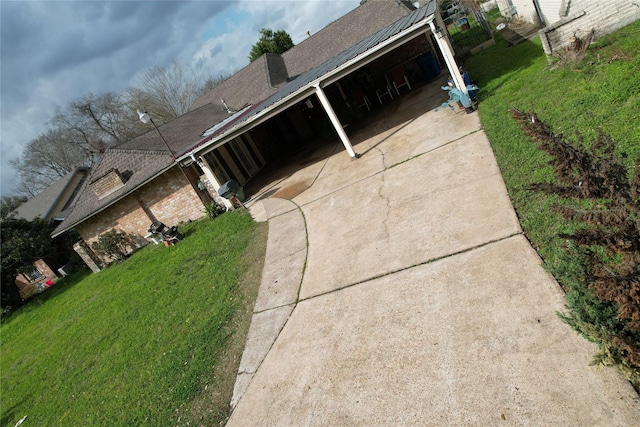 exterior space featuring a lawn