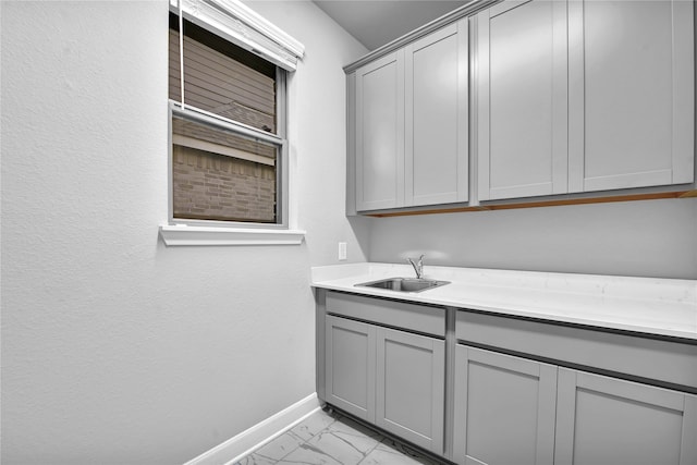 laundry room featuring sink