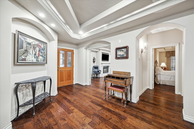 entrance foyer with dark hardwood / wood-style flooring