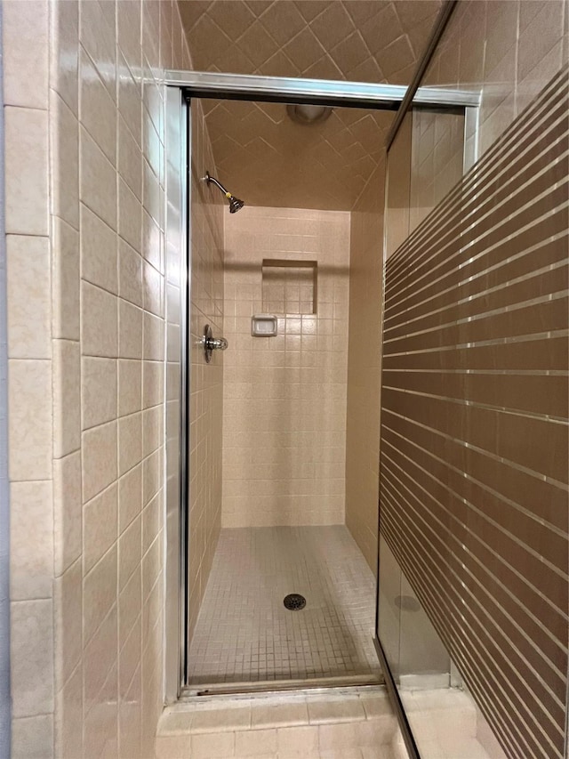 bathroom with an enclosed shower