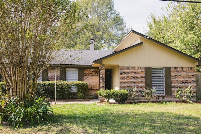 ranch-style house with a front yard