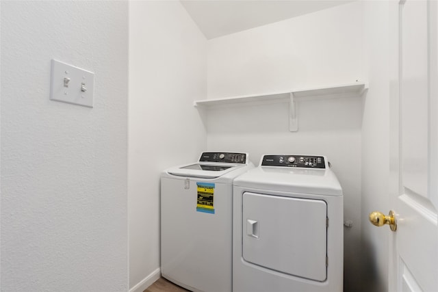 laundry area featuring independent washer and dryer