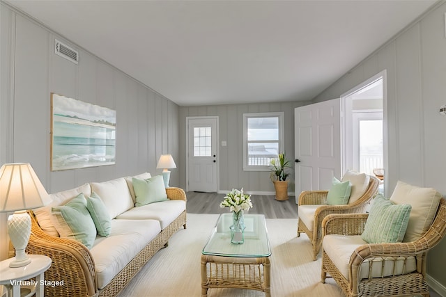 living room with light hardwood / wood-style flooring