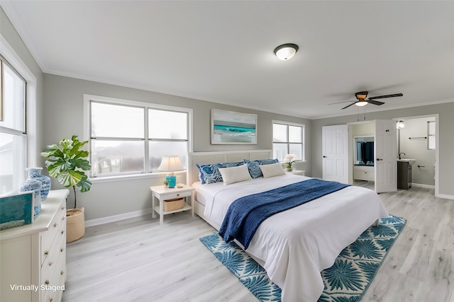 bedroom with ceiling fan, light hardwood / wood-style flooring, and ornamental molding