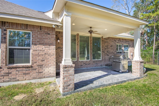 property entrance featuring ceiling fan and a patio area