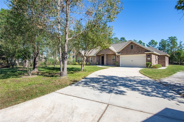 16979 Concord Dr, Conroe, TX 77385 - view of front facade featuring concrete driveway, an attached garage, brick siding, and a front yard