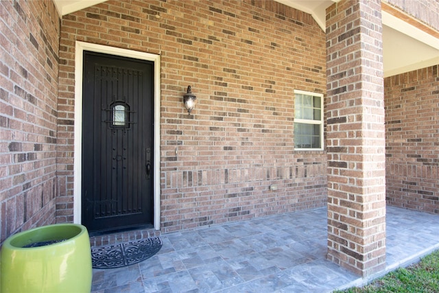 16979 Concord Dr, Conroe, TX 77385 - view of exterior entry with brick siding