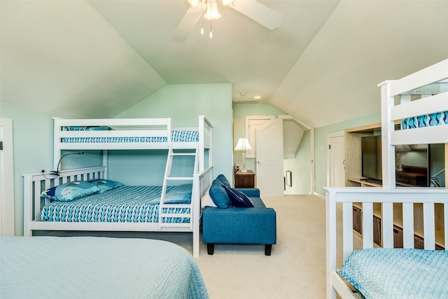 bedroom with carpet flooring, ceiling fan, and lofted ceiling