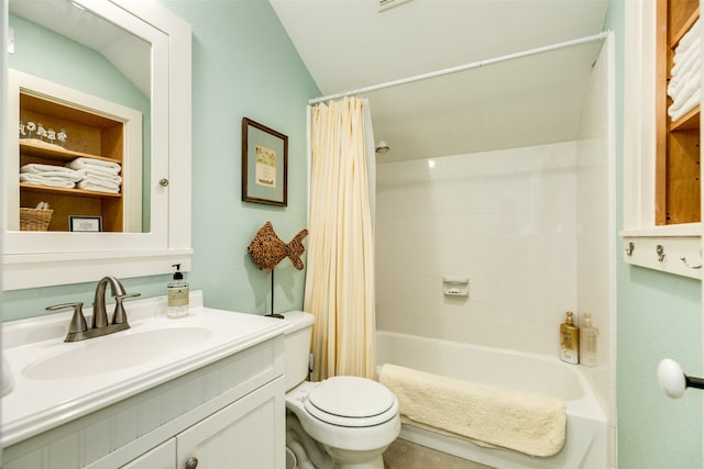 full bathroom with vanity, toilet, lofted ceiling, and shower / tub combo with curtain