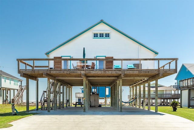 exterior space featuring a carport and a deck