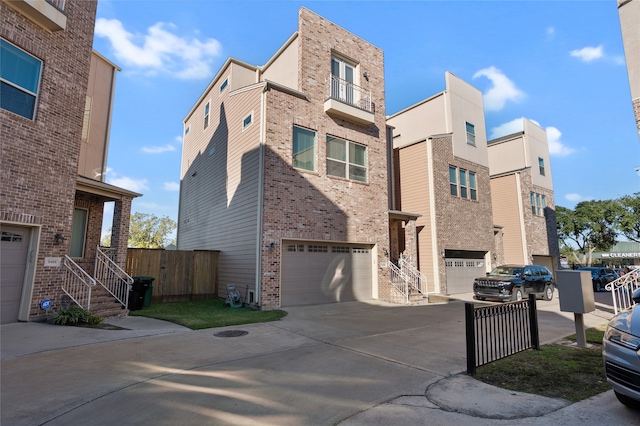 townhome / multi-family property with a garage