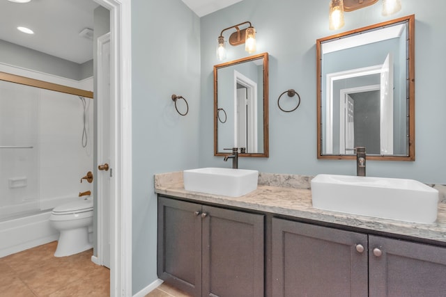 full bathroom featuring tile patterned flooring, vanity, toilet, and shower / bathtub combination