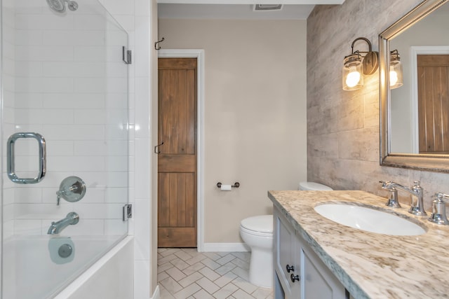 full bathroom with tile patterned flooring, vanity, toilet, and washtub / shower combination