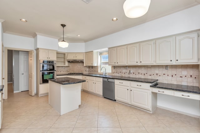 kitchen with a center island, backsplash, crown molding, hanging light fixtures, and stainless steel appliances