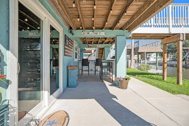 view of patio / terrace featuring a water view