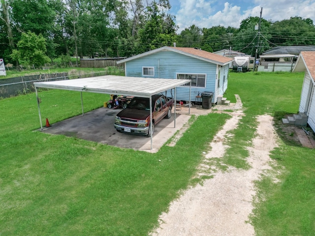 exterior space featuring a carport