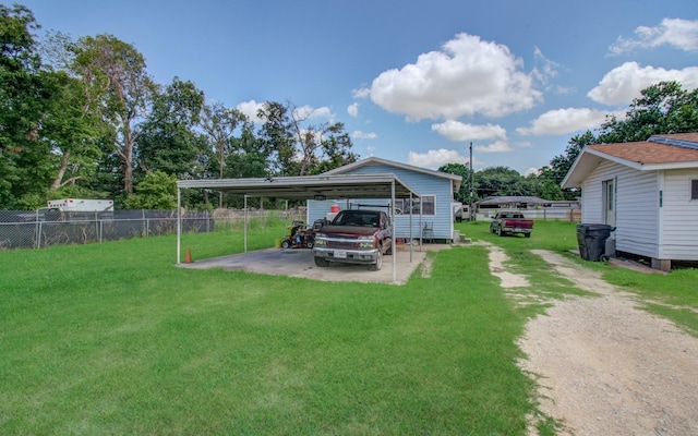 view of yard with a carport