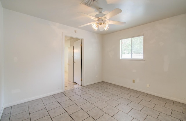 spare room featuring ceiling fan