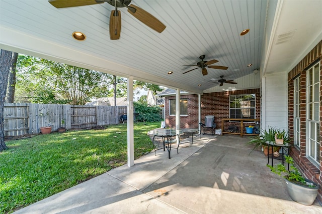 view of patio featuring ceiling fan